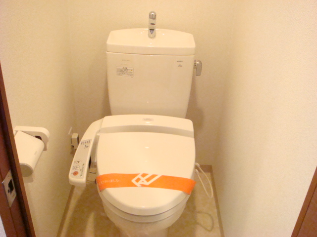 Toilet. Washlet is with