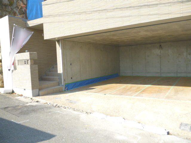 Parking lot. With shutter dug-down garage