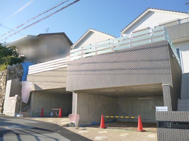 Local appearance photo. Dug-down garage parking two Allowed with shutter