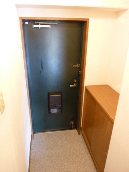 Entrance. With cupboard