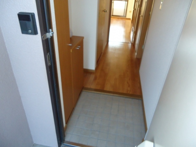 Entrance. It is with cupboard.