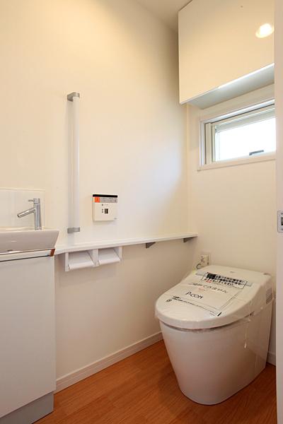 Toilet. Since tankless toilet, To clean and stylish space. Also firmly secure space that can accommodate a toilet supplies. 