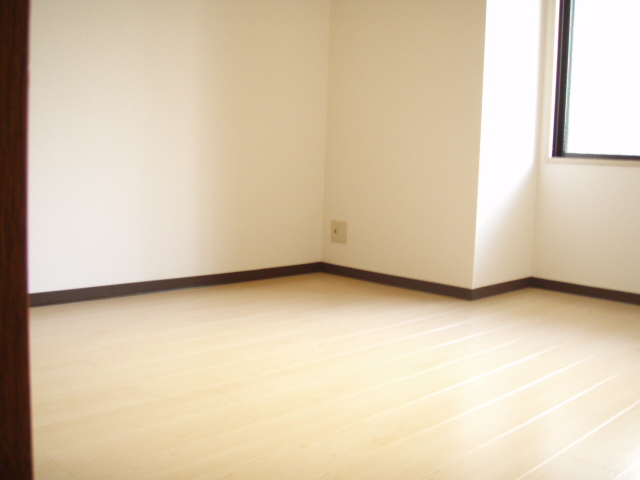 Other room space. Bright is the flooring.