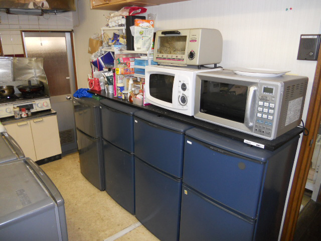 Kitchen. Shared refrigerator is one each