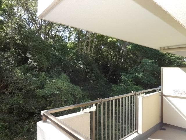 Balcony. South toward balcony of Hidamari. Green is visible from the room.