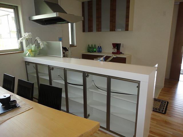 Same specifications photo (kitchen). Under the counter storage rack