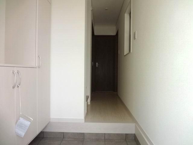 Entrance. The first floor entrance hall. Shoes is with a box. 