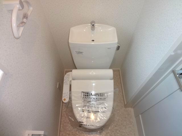 Toilet. First floor toilet. Shower toilet. 