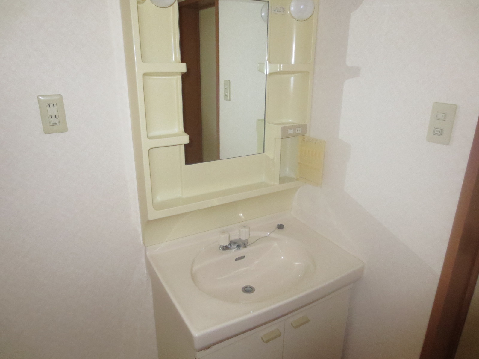 Washroom. It is a large mirror