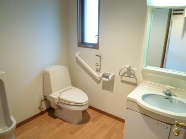 Toilet. The first floor of the toilet and wash basin