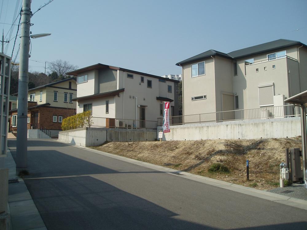 Local photos, including front road. Residential area in the city skyline