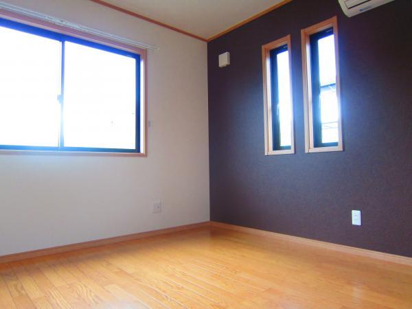 Non-living room. On one side is design wallpaper. Please to the nursery.