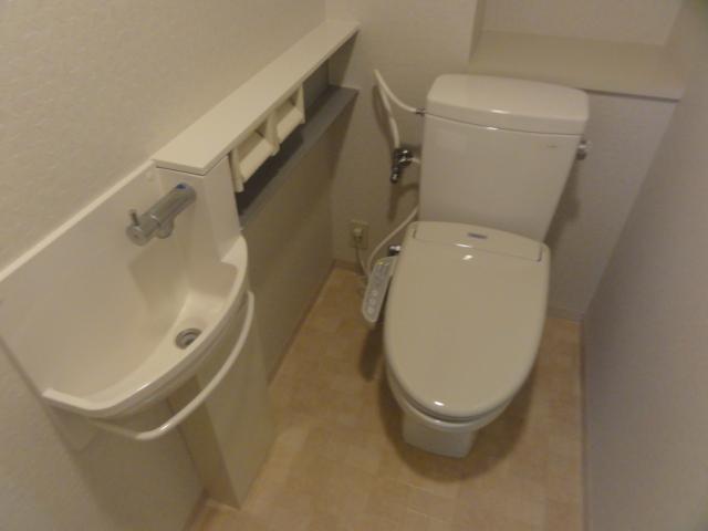 Toilet. Bidet and with hand-wash