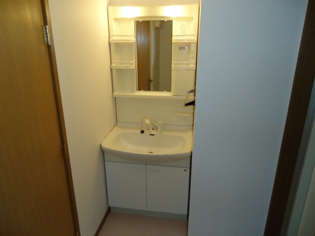 Washroom. With separate wash basin