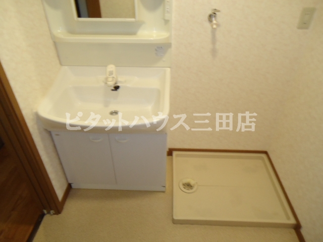 Washroom. With separate wash basin