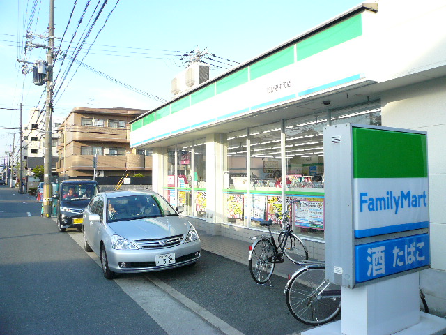 Convenience store. FamilyMart Nishinomiya satonaka the town store (convenience store) to 104m