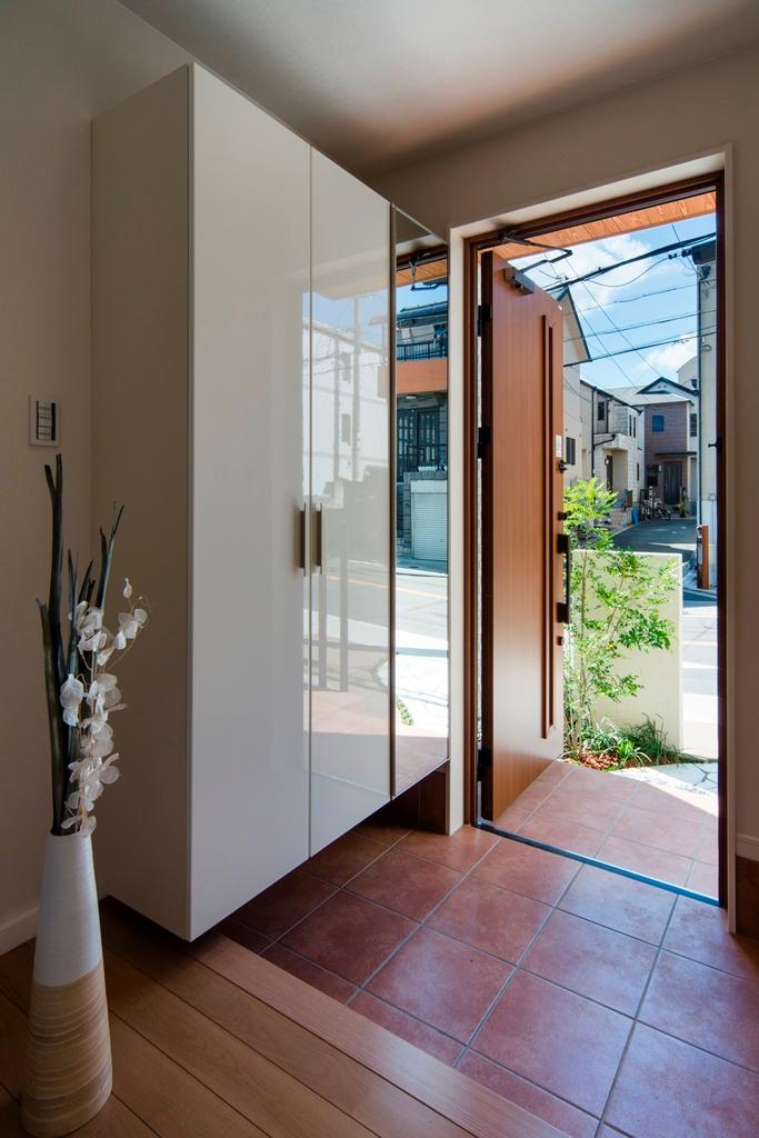 Model house photo. Bright entrance of large capacity storage.