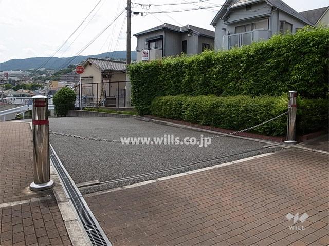 Parking lot. Robot gate has been installed at the entrance to the parking lot.