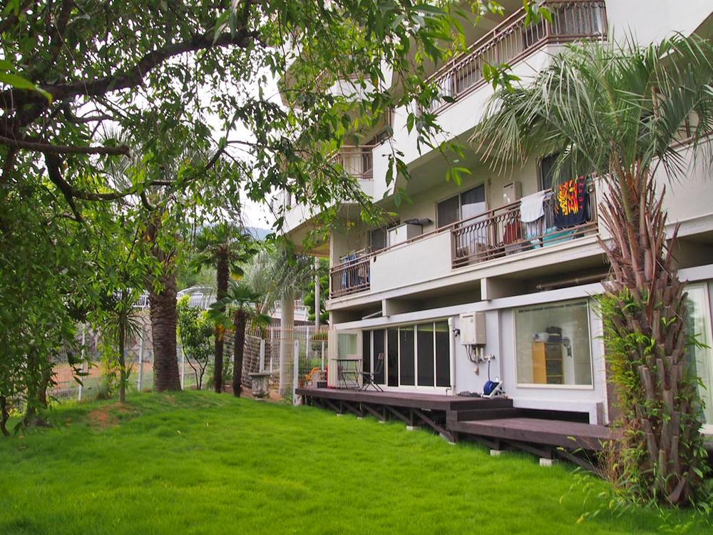 Local appearance photo. Local building as seen from the private garden