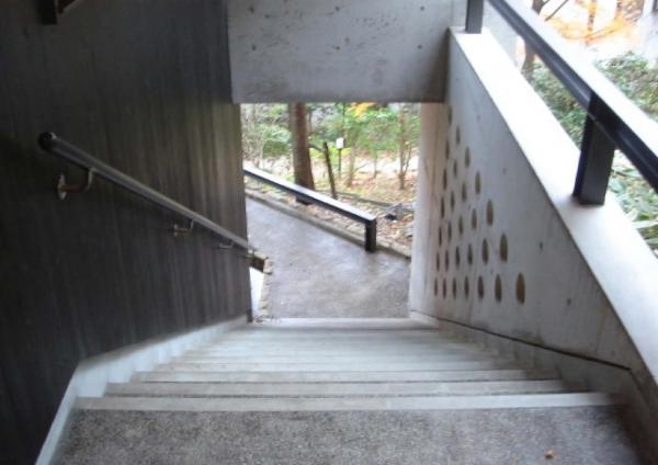 Entrance.  ■ Entrance approach ■  Stairs of concrete building. Carousel exudes an elegant atmosphere.