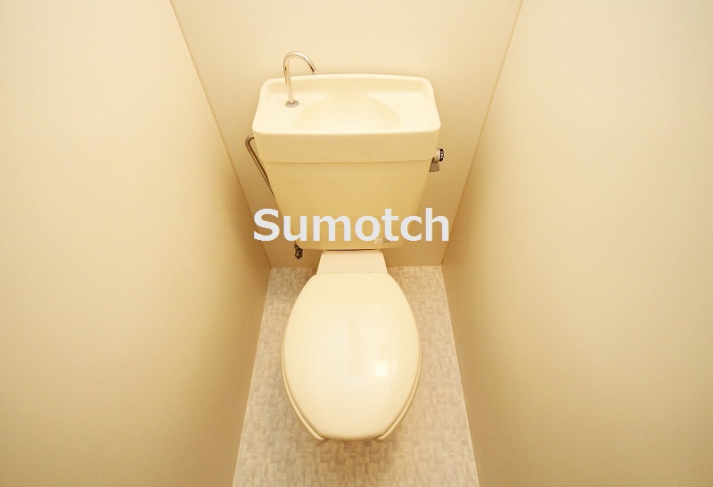 Toilet. Same type of image is a photo.