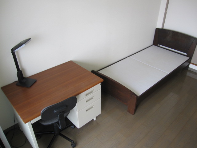 Other Equipment. Desk and a bed