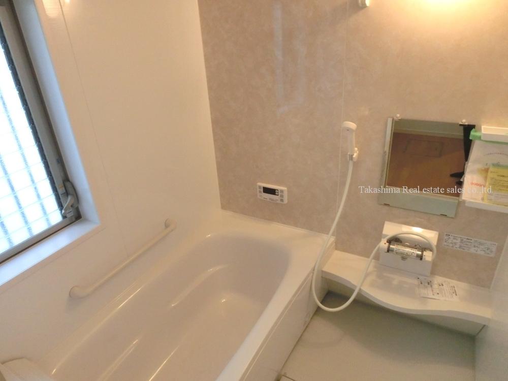 Bathroom. In the bathroom drying heater with system bus is there is a big window. 