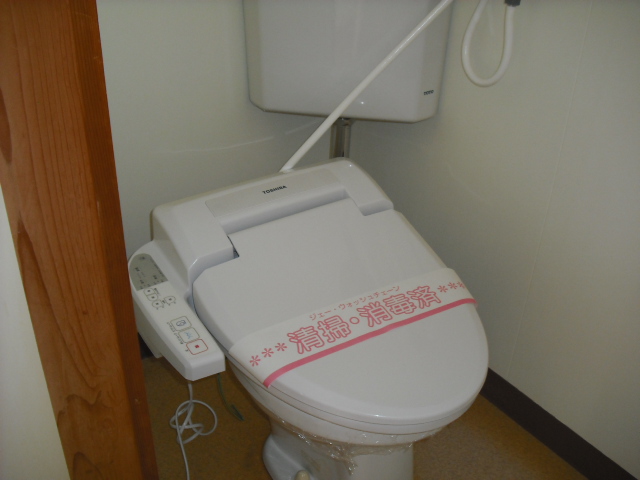 Toilet. Washlet comes with a! 