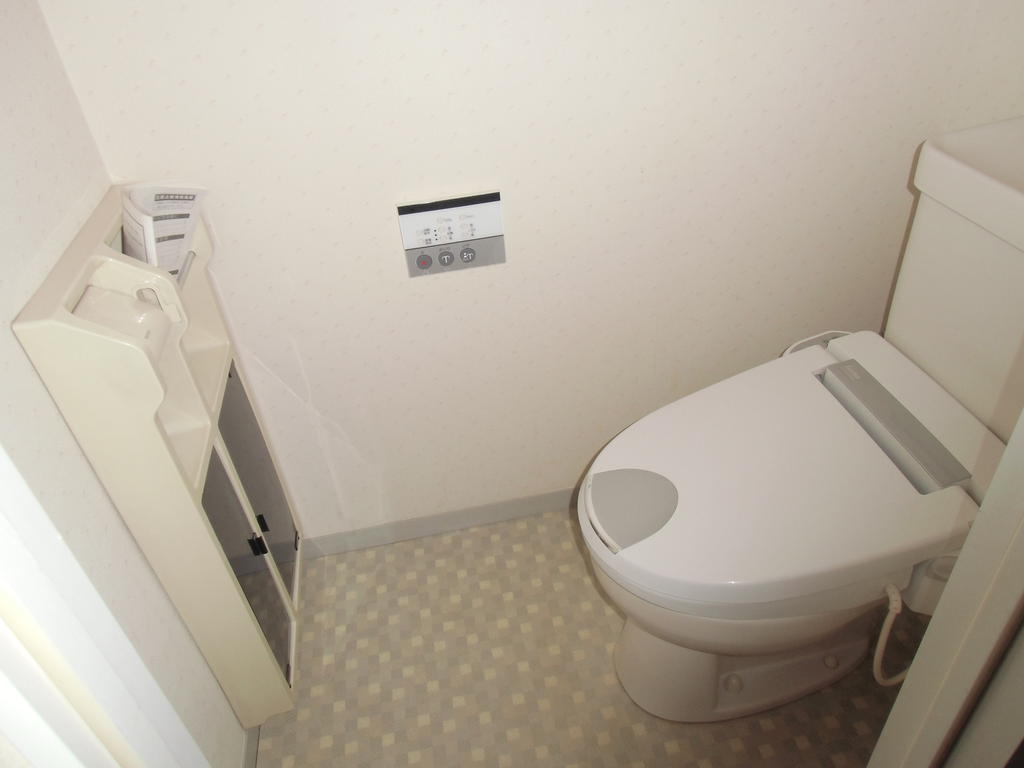 Toilet. Towel rack ・ It is a bidet with a toilet that is also equipped with storage compartment! 