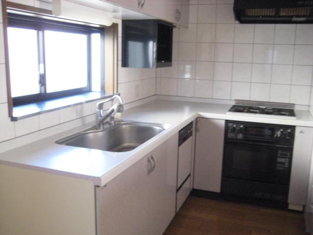 Kitchen. Bright kitchen that comes with a larger window!
