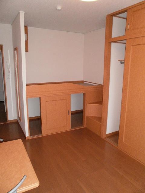 Living and room. Also storage space under the bed