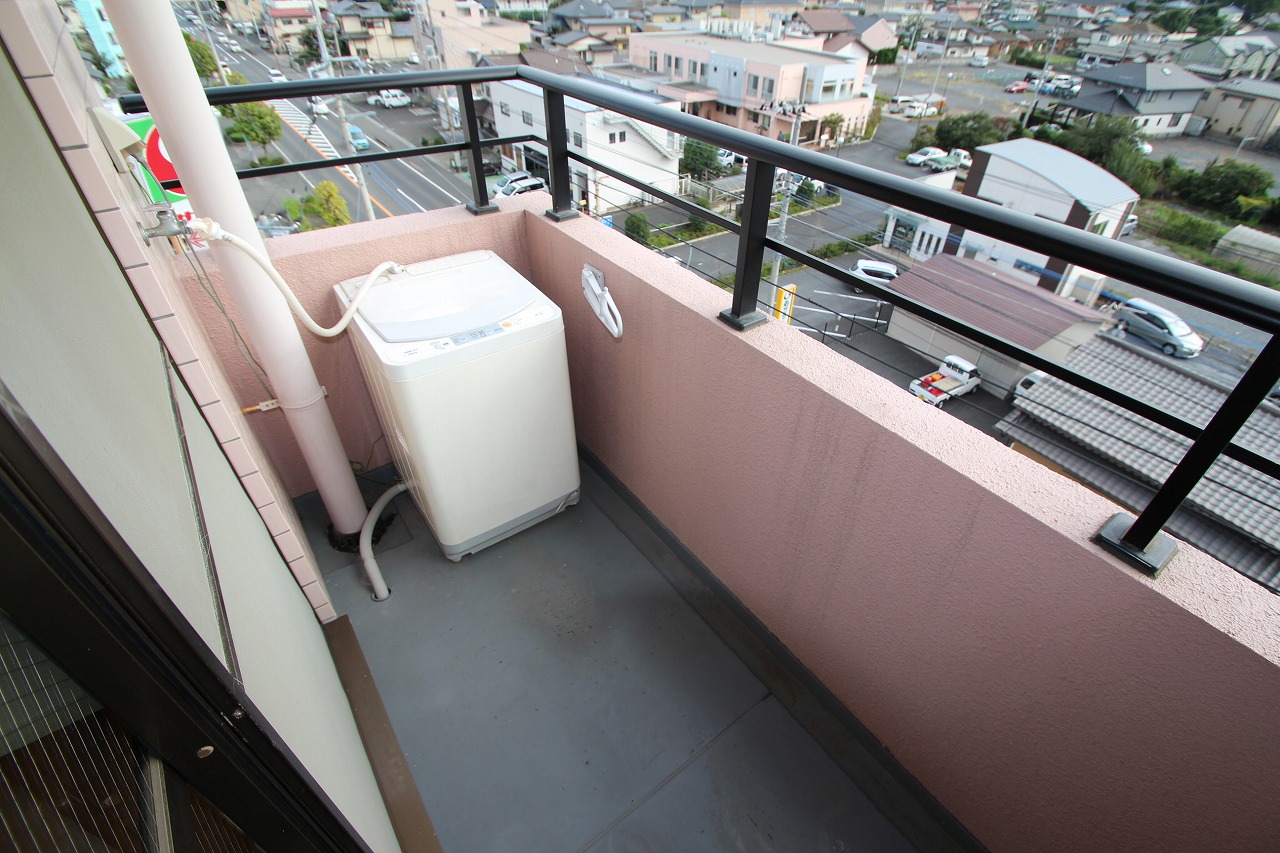 Balcony. Washing machine is put balcony. 