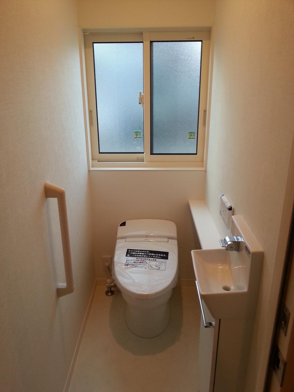 Toilet. It is spacious space. 