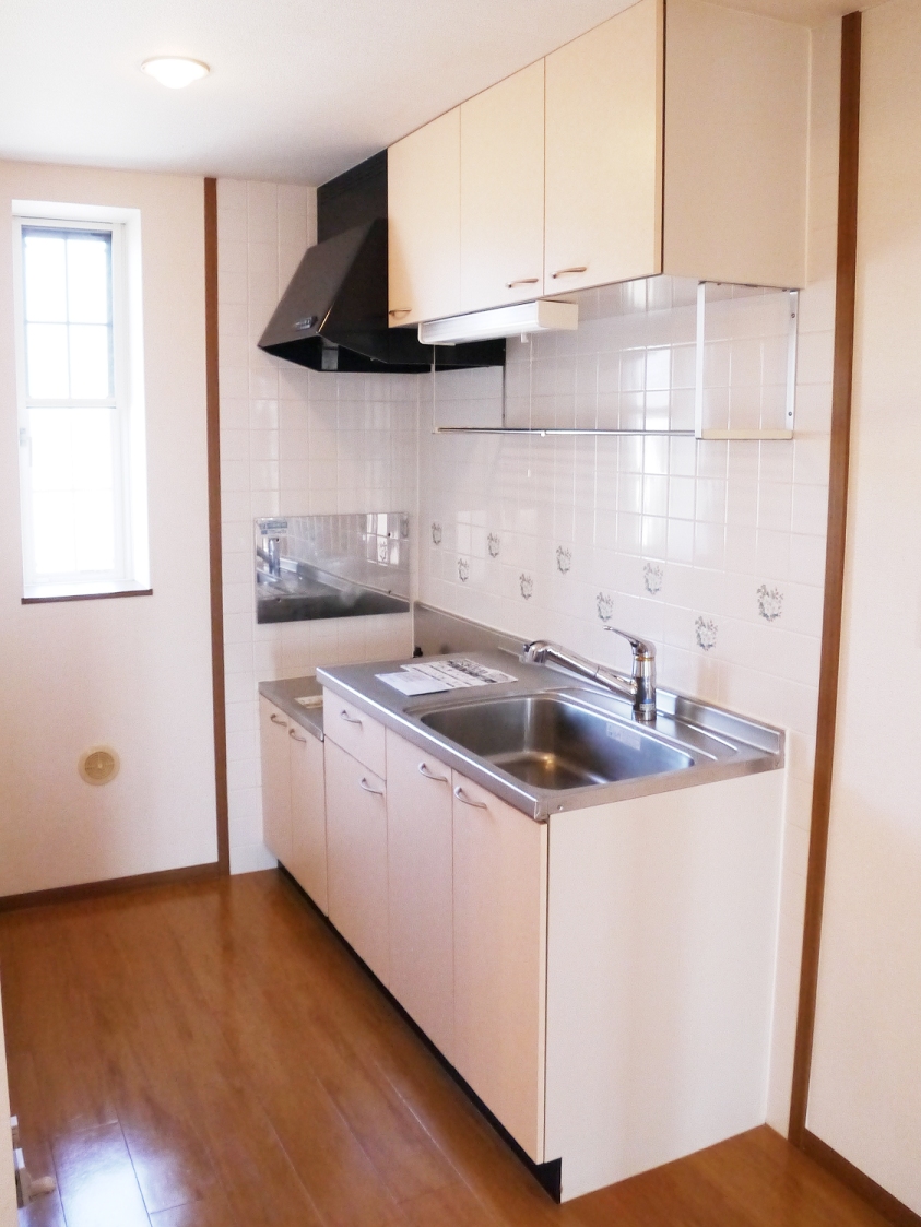 Kitchen. Shower head kitchen. It is well-ventilated also good because there is a window