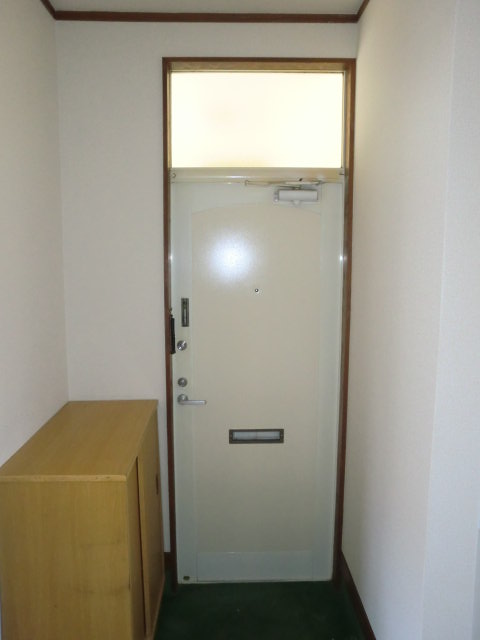 Entrance. With cupboard