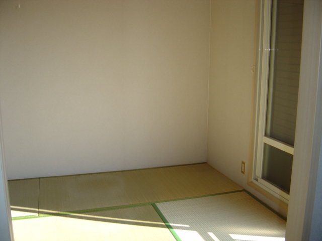 Living and room. There are six tatami Japanese-style shutters