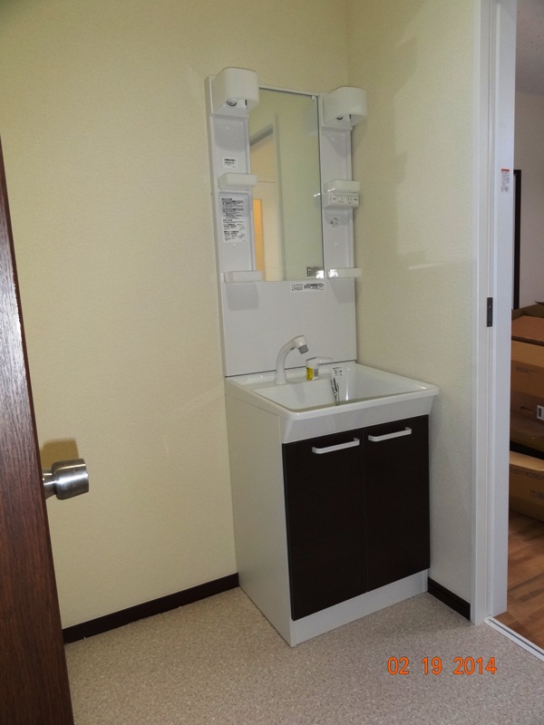 Washroom. It is a small type, but is equipped with a vertical shower