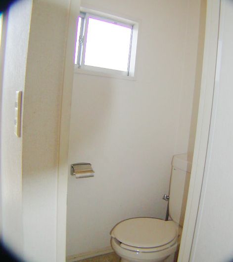 Toilet. With window. 