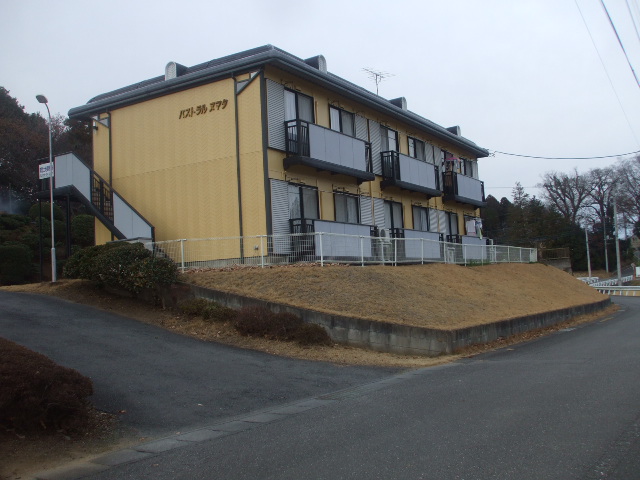 Building appearance. It is higher than a little road.