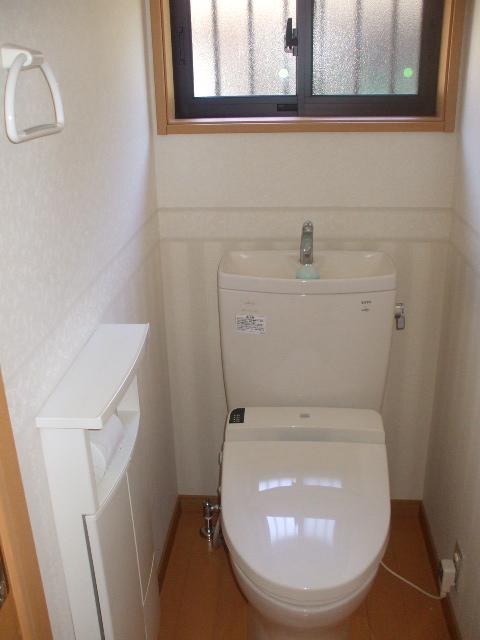 Toilet. Indoor (11 May 2013) Shooting. Toilet and embedded storage is attached with a bidet. Second floor toilet is also a bidet.
