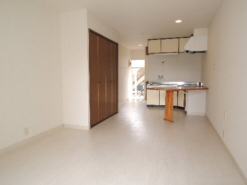 Living and room. It feels widely brightly on the floor color of white
