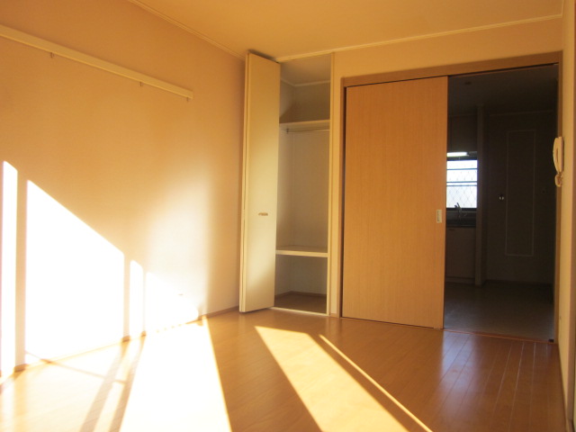 Living and room. It is small but there is also a storage space, The room also clean! 