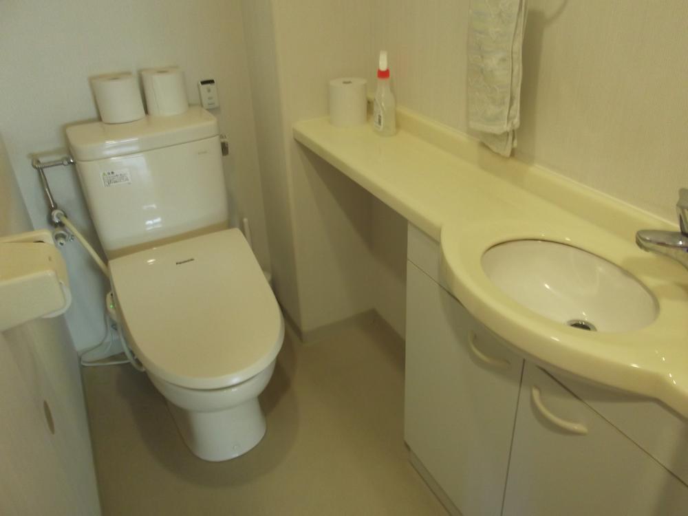 Toilet. It is with a restroom.