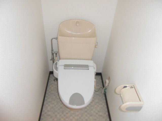 Toilet. Western-style toilet. Bus toilet is separate