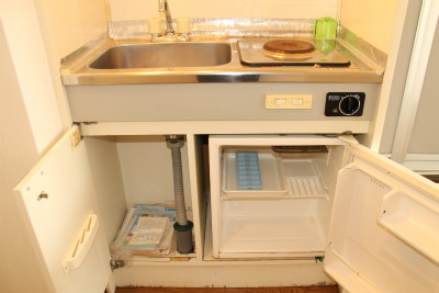 Kitchen. It comes with a sip gas stove + mini fridge