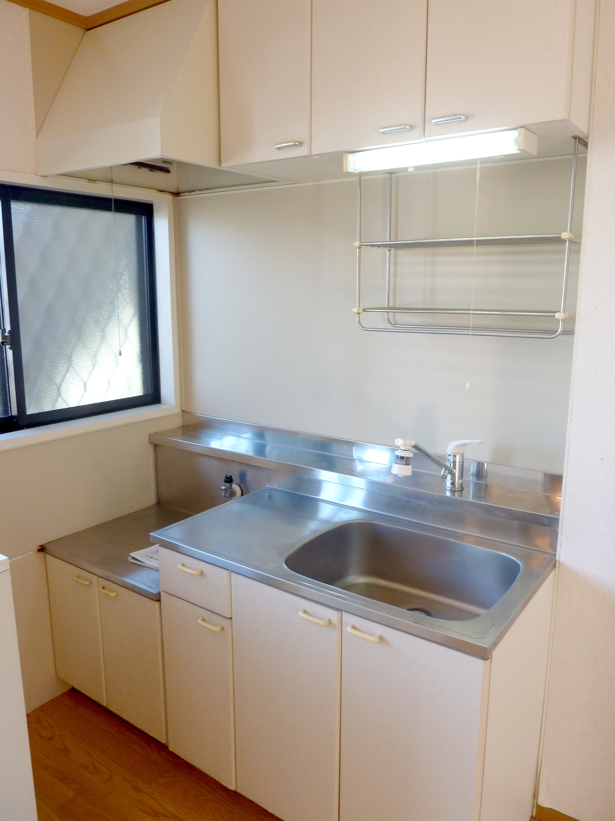 Kitchen. It is a spacious kitchen also ~ Moreover, with window! 