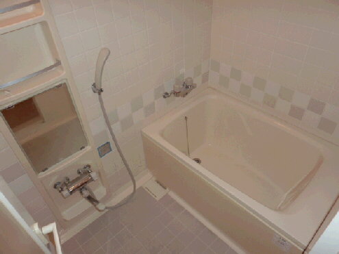 Bath. It is a photograph of the 302 in Room.