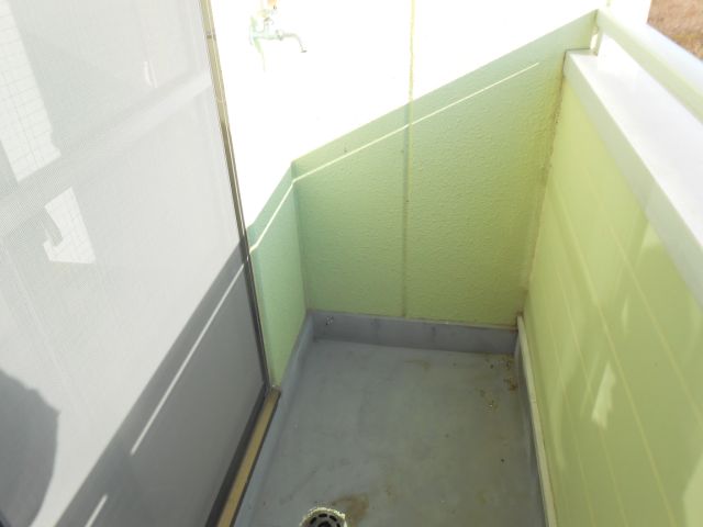 Washroom. It is a washing machine place in the veranda. 