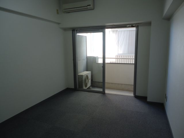 Living and room. It is the carpet of the room. Also it comes with air conditioning. 