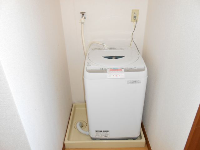 Washroom. It is with fully automatic washing machine.